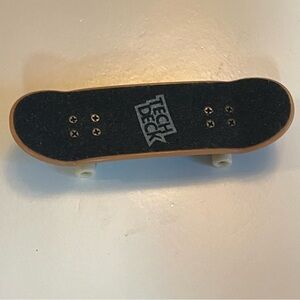 Tech Deck Mini Skateboard with Black Grip Tape skulls and roses